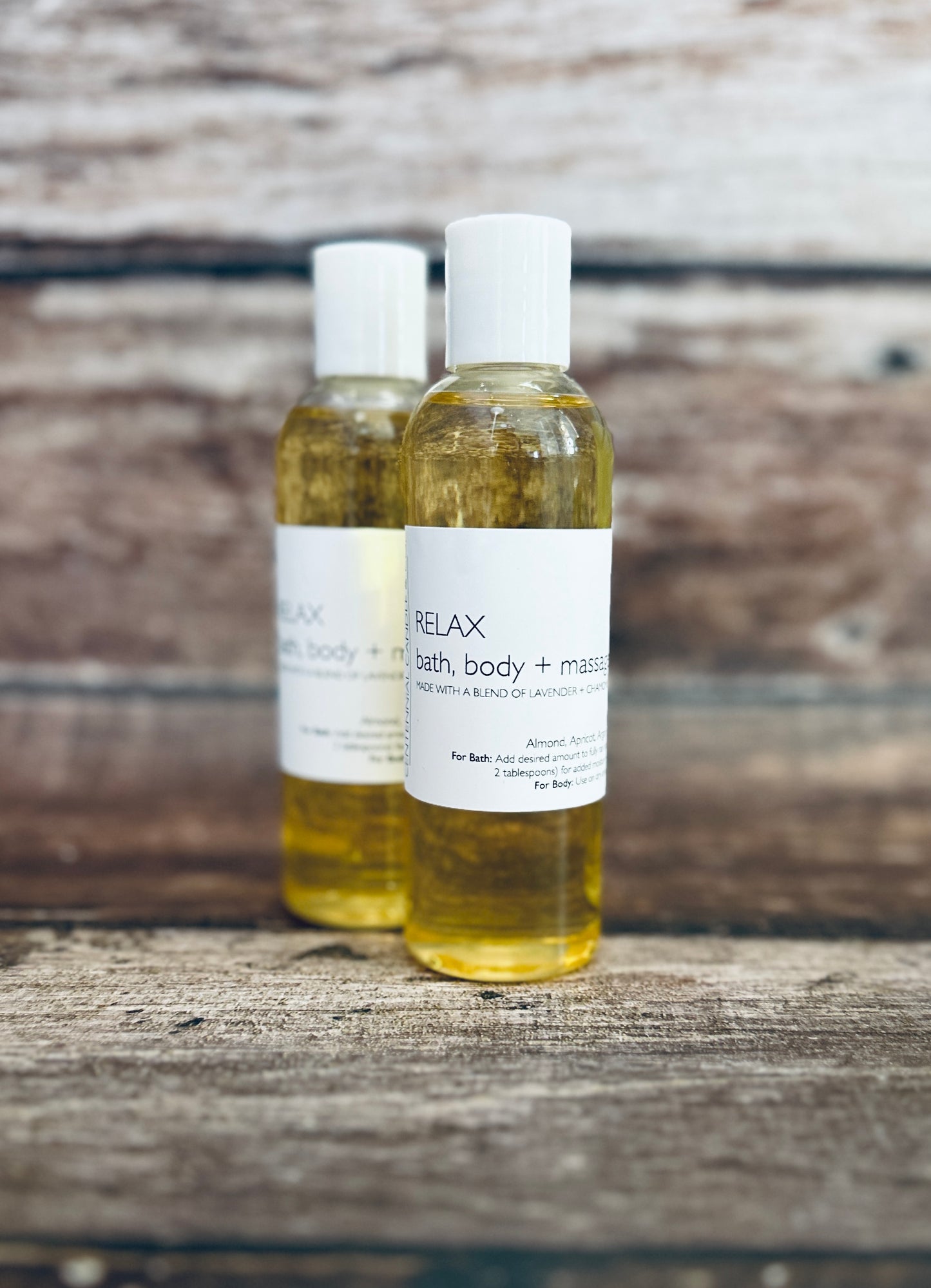 two bottles of relax body and massage oil